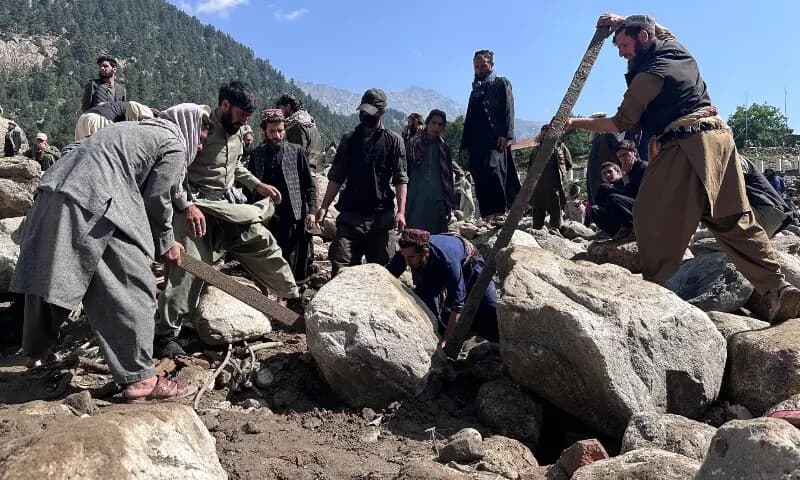 Afghans search for dozens missing, some with bare hands, after devastating flood in Nuristan province