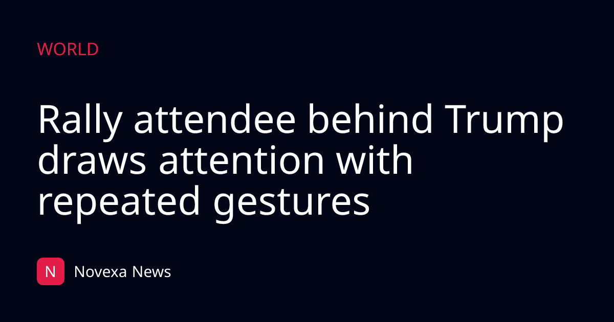 Rally attendee behind Trump draws attention with repeated gestures